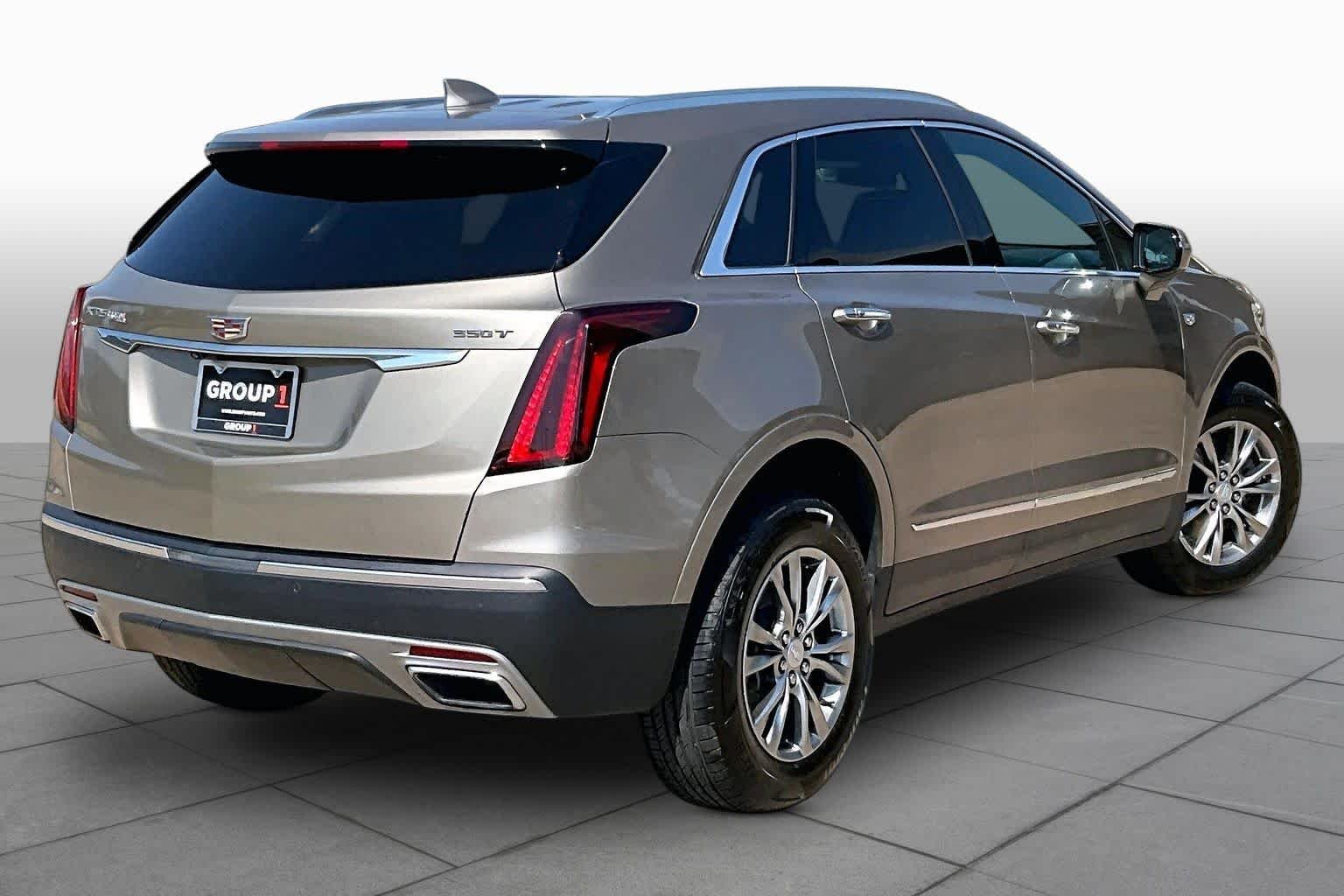 Used 2023 Latte Metallic Cadillac FWD Premium Luxury image 25