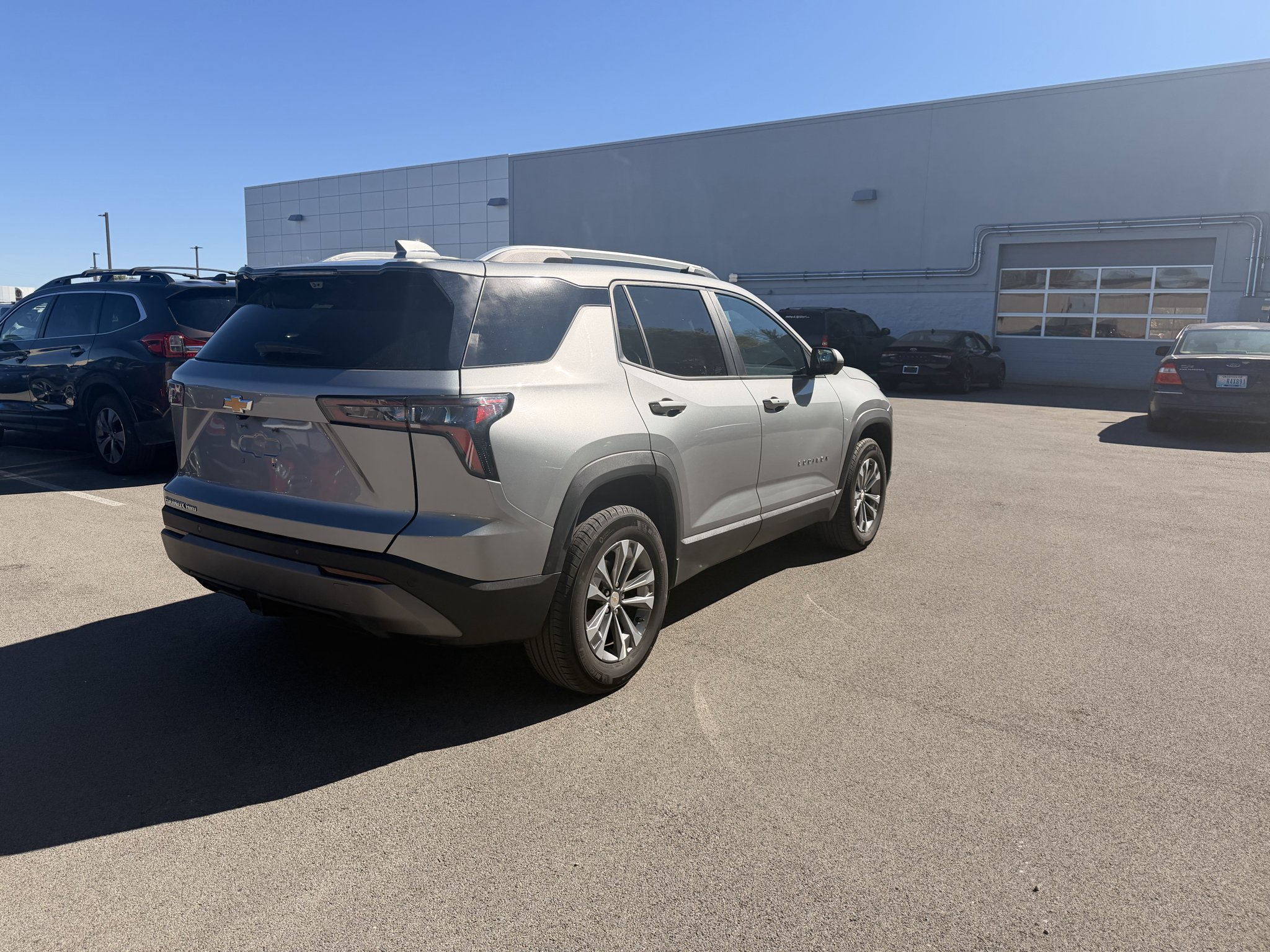 Used 2025 Sterling Gray Metallic Chevrolet AWD LT image 4