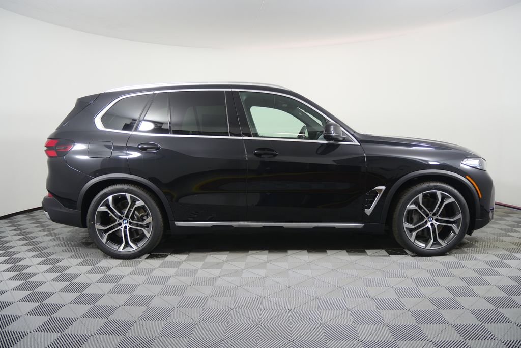 New 2026 Black Sapphire Metallic BMW xDrive50e image 3