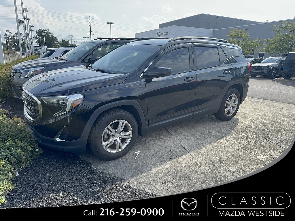 Used 2018 Ebony Twilight Metallic GMC SLE image 1