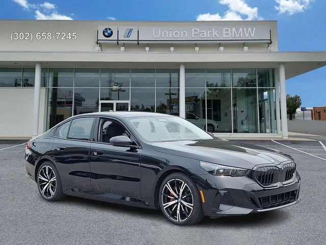 Used 2026 Black Sapphire Metallic BMW 550e xDrive image 3
