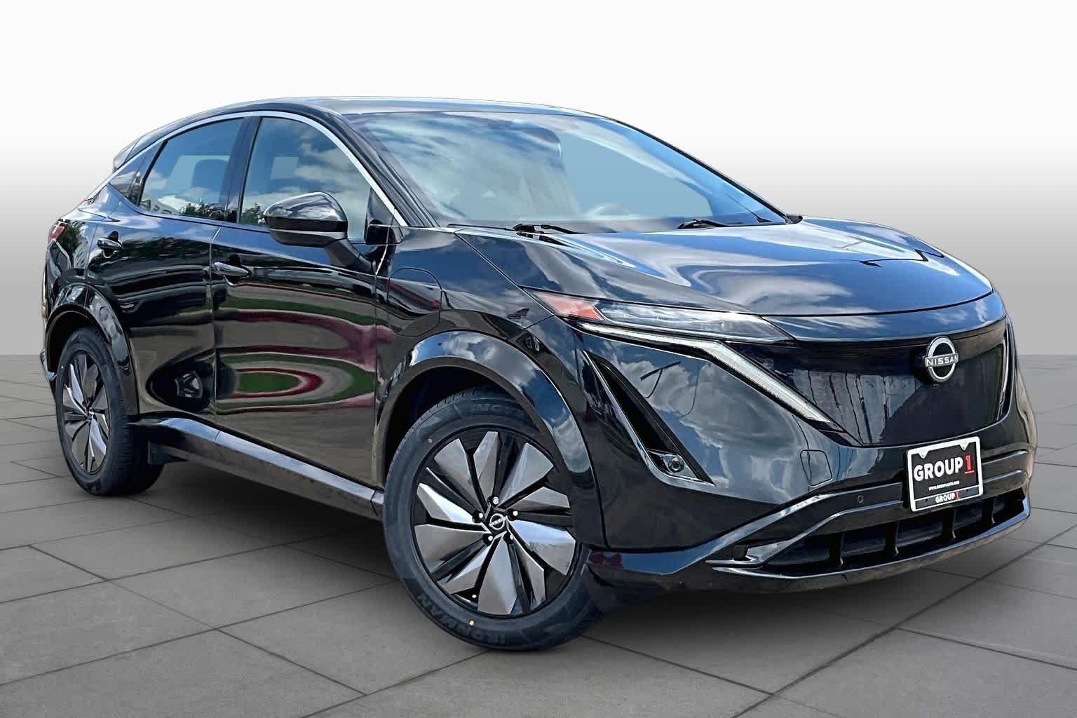 Certified Used 2023 Black Diamond Pearl Nissan VENTURE+ image 2