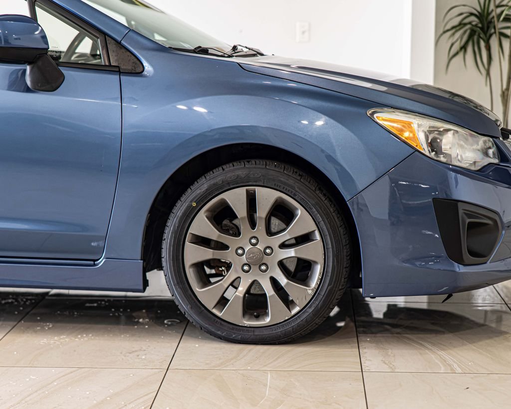 Used 2014 Blue Subaru 2.0i Sport Premium image 10