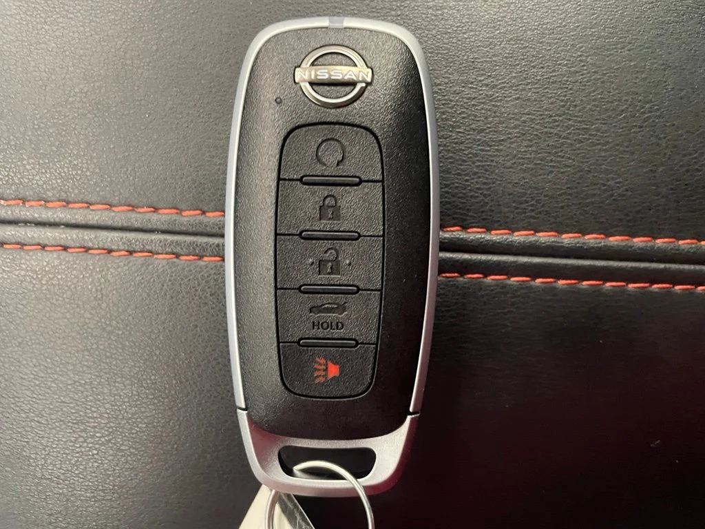 Certified Used 2024 Blue Nissan SR image 18
