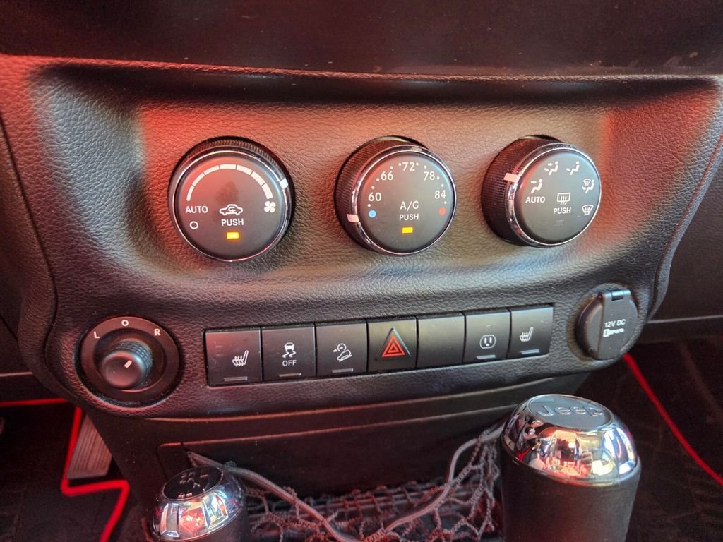 Used 2015 Red Jeep Unlimited Sahara image 24