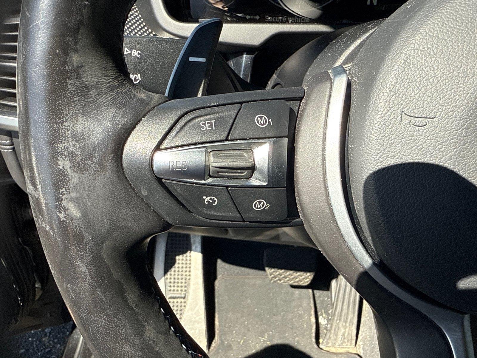 Used 2018 Black Sapphire Metallic BMW  image 14