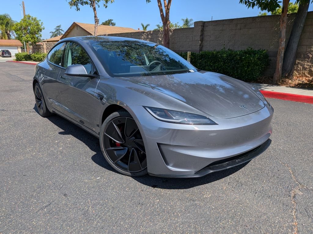 Used 2025 Silver Tesla Performance image 1