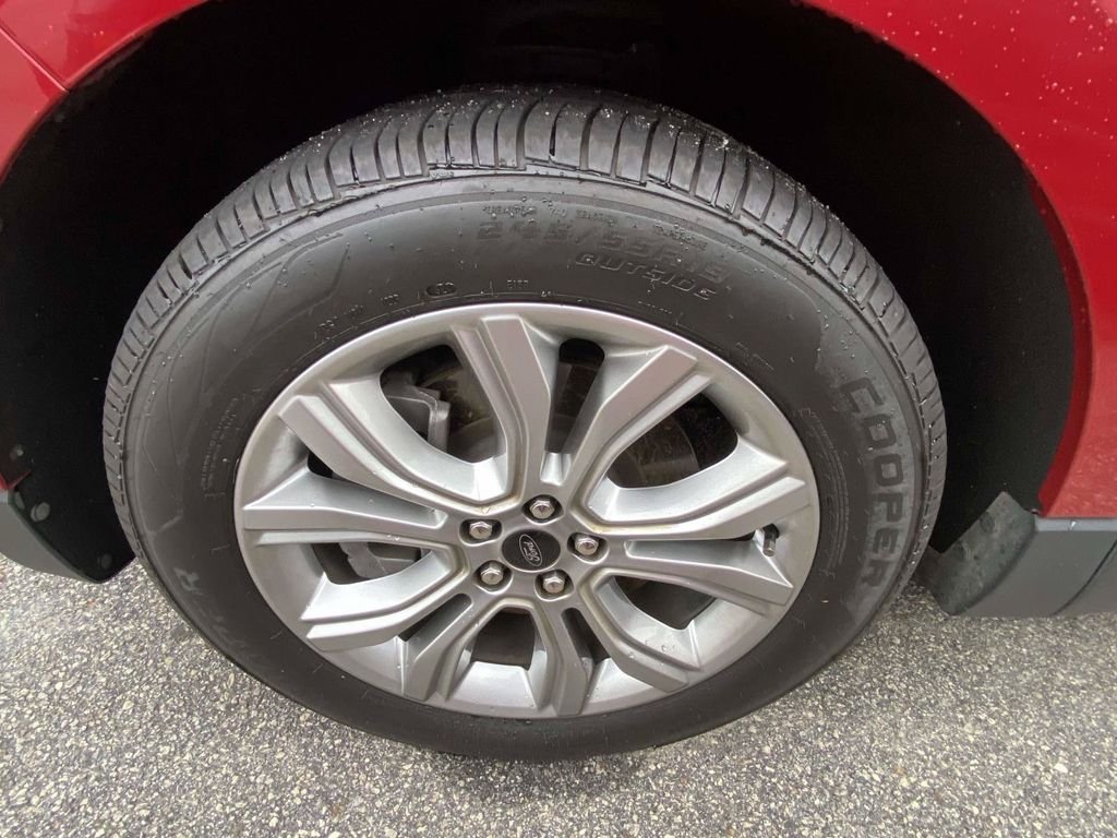Certified Used 2023 Rapid Red Metallic Tinted Clearcoat Ford Titanium image 4