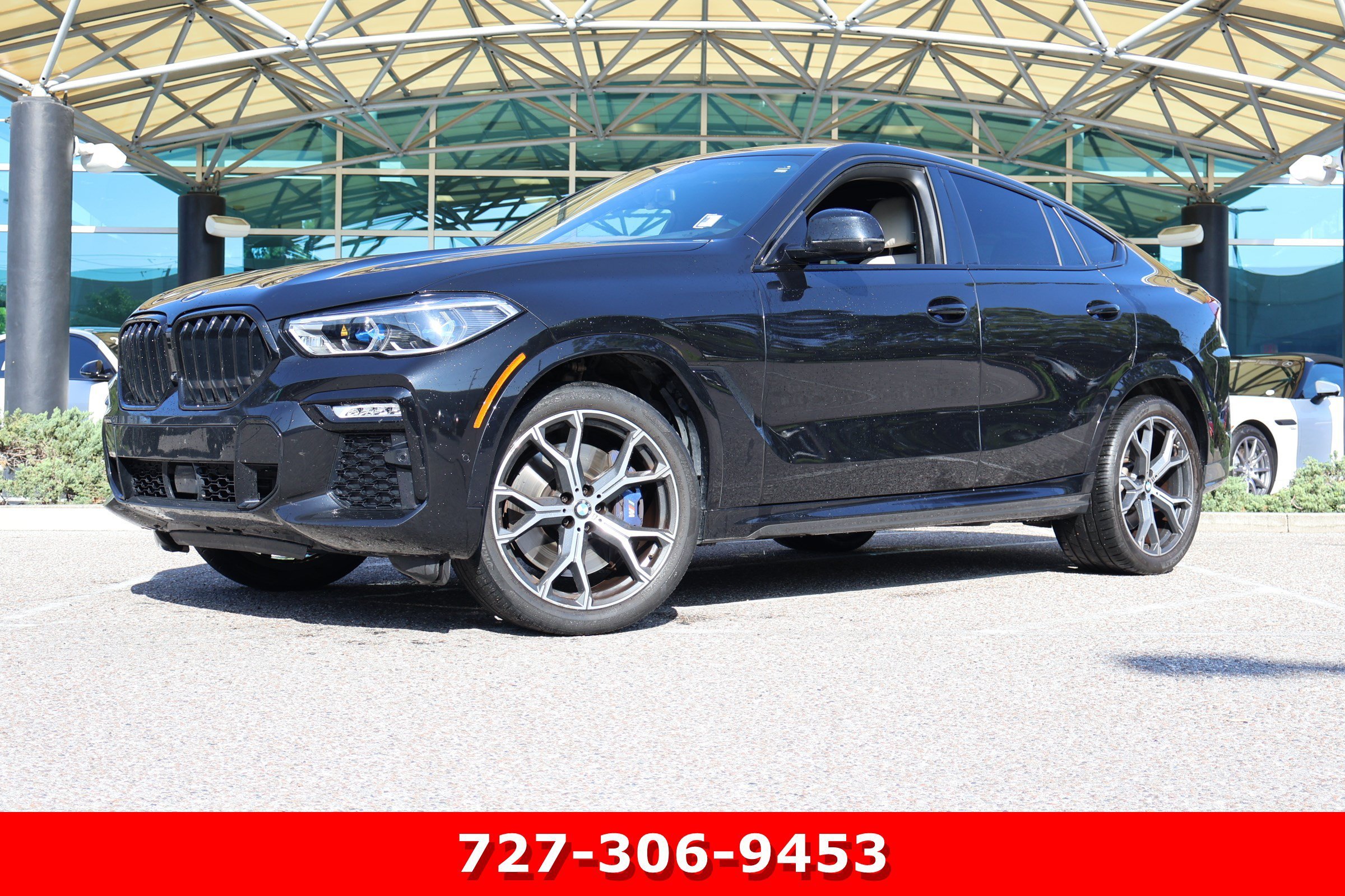 Used 2021 Black Sapphire Metallic BMW M50i image 1
