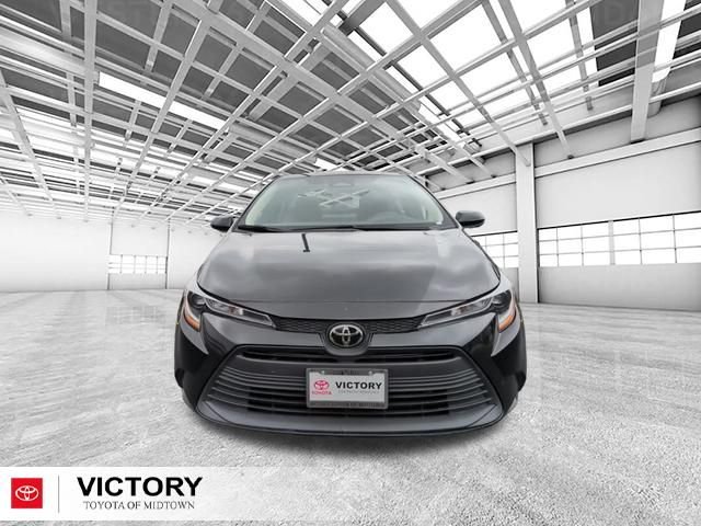 Used 2024 Black Toyota LE image 9