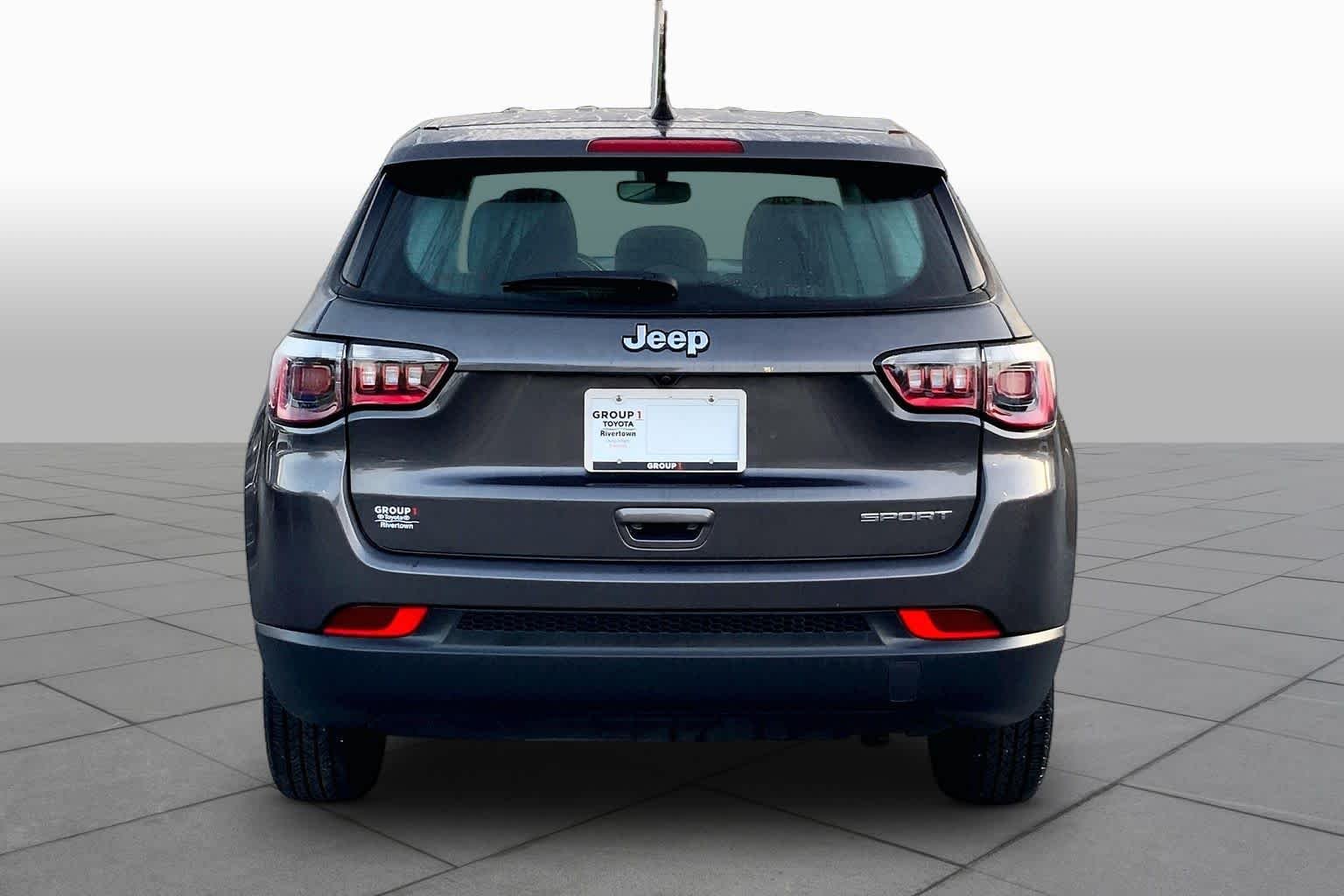 Used 2021 Granite Crystal Metallic Clearcoat Jeep Sport image 5