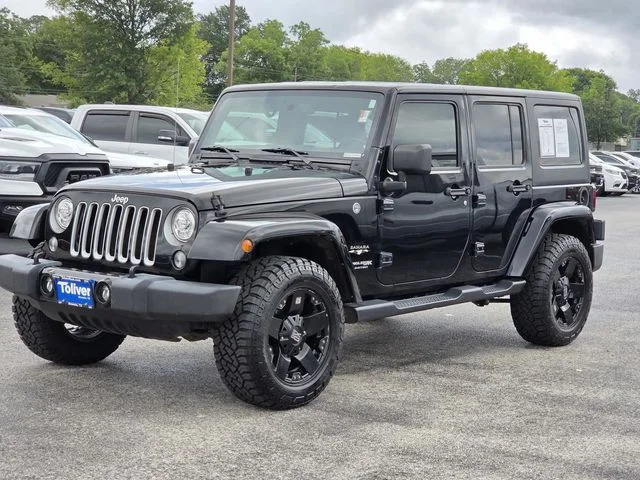 Used 2018 Black Jeep Unlimited Sahara image 4
