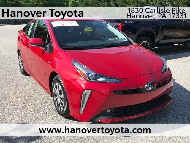 Certified Used 2022 Supersonic Red Toyota LE image 1