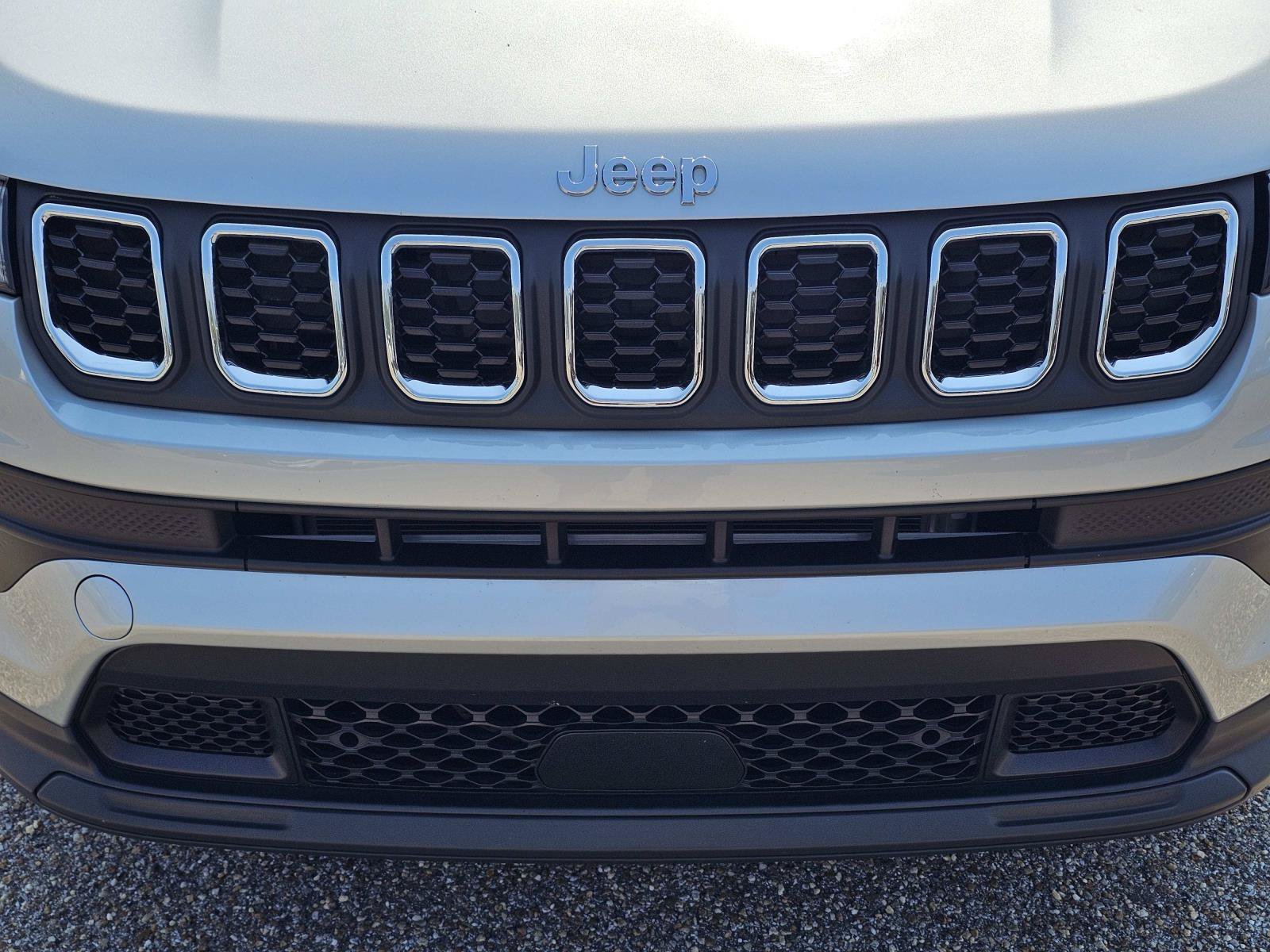 Used 2025 Silver Zynith Metallic Clearcoat Jeep Sport image 3