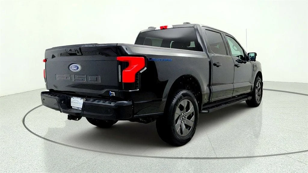 Used 2023 Agate Black Metallic Ford XLT 4WD SuperCrew 5.5