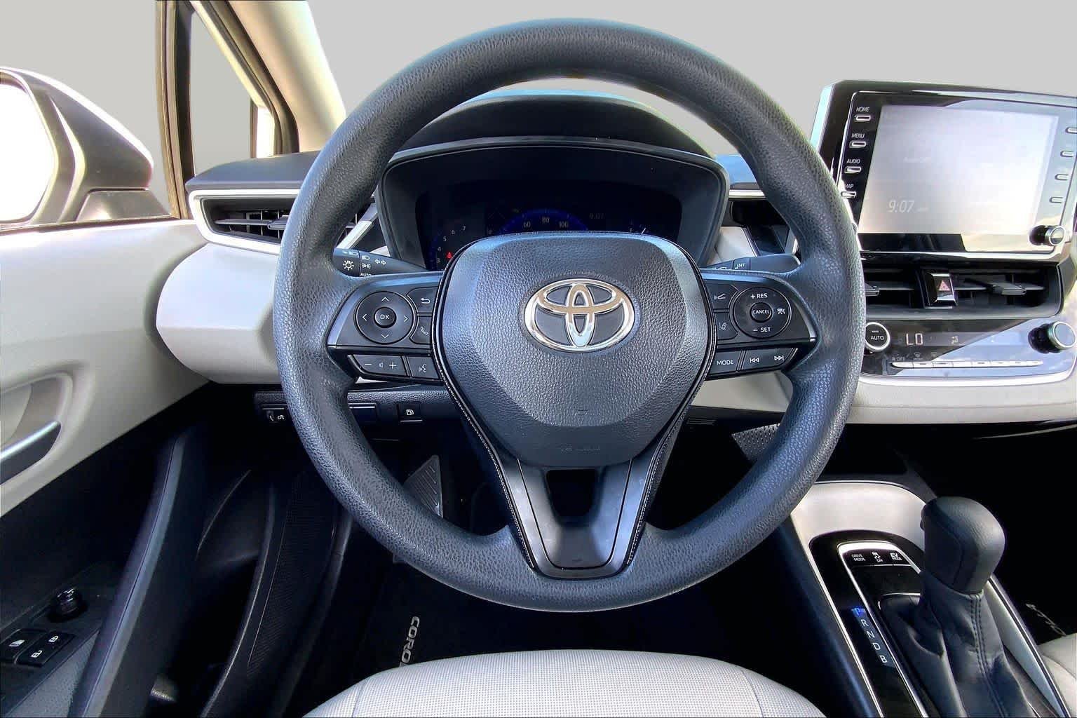 Used 2020 Super White Toyota Hybrid LE image 6