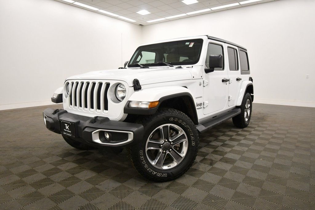Used 2021 Jeep Wrangler Unlimited Sahara with VIN 1C4HJXEG1MW652966 for sale in Rochester, Minnesota
