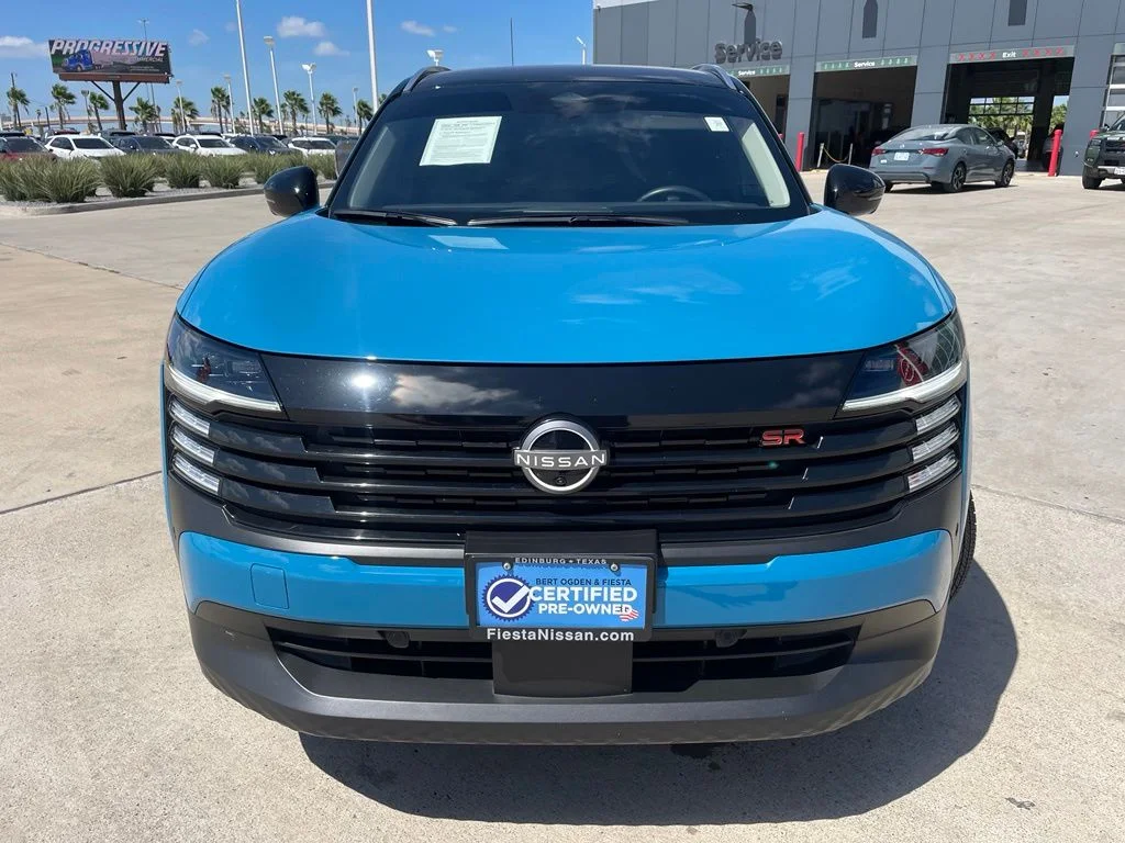 Certified Used 2025 White Nissan SR image 2