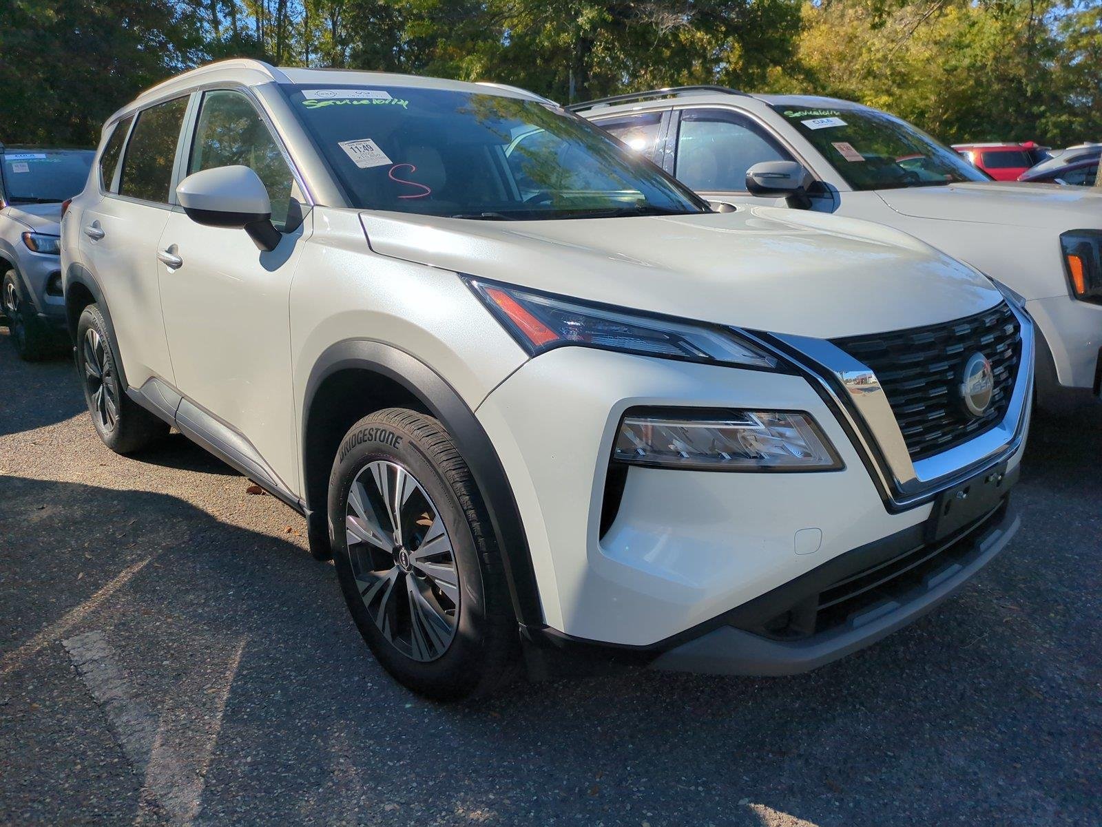 Used 2023 Pearl White Tricoat Nissan SV image 1