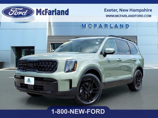 Used 2025 Jungle Green Kia EX X-Line image 1
