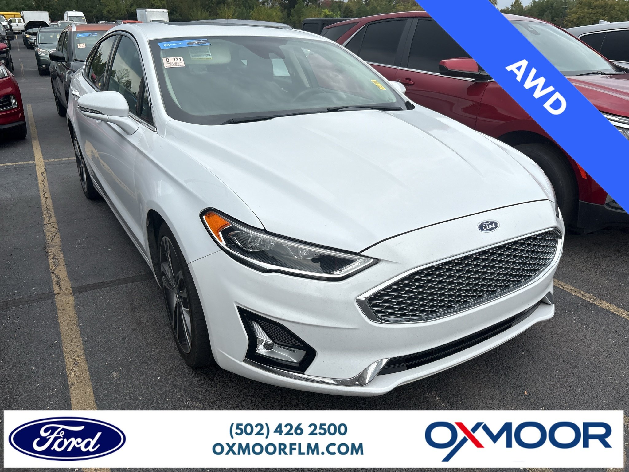 Used 2020 Oxford White Ford Titanium image 1
