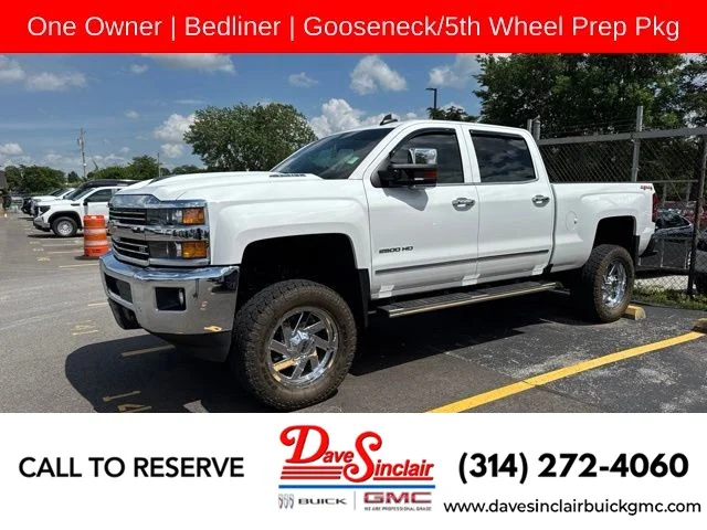 Used 2019 Summit White Chevrolet 4WD Crew Cab 153.7" LTZ image 1