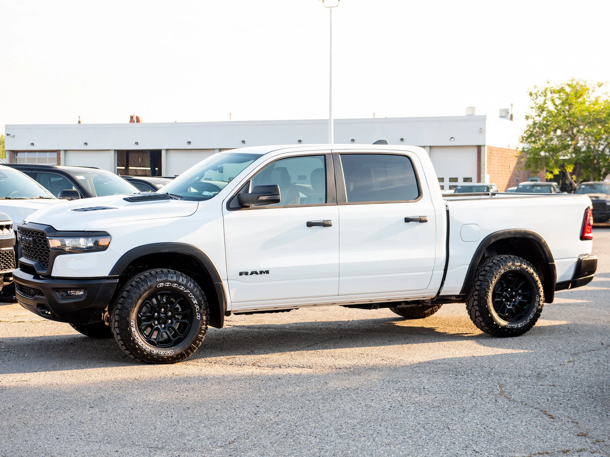 New 2026 White RAM Rebel* Crew Cab 4x4, 33 Inch A/T Tires, Heated Seats, Nav, Alpine Audio image 3