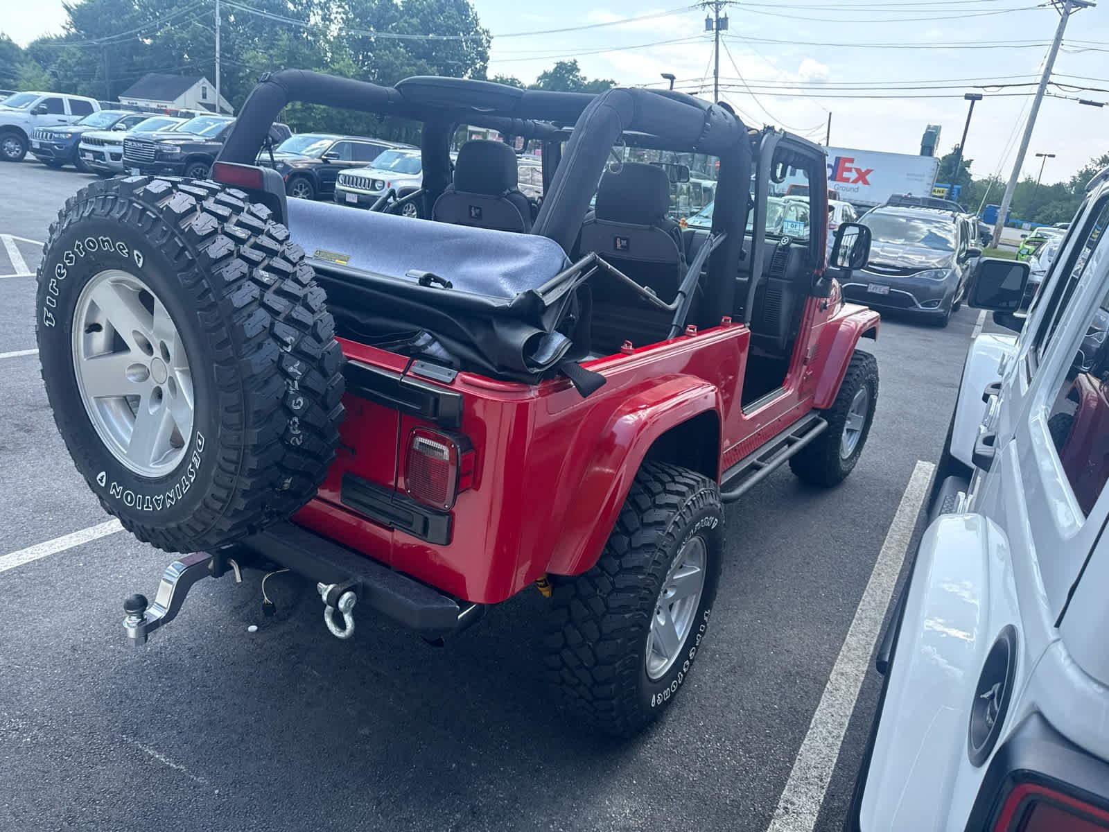 Used 2004 Flame Red Jeep Unlimited image 2