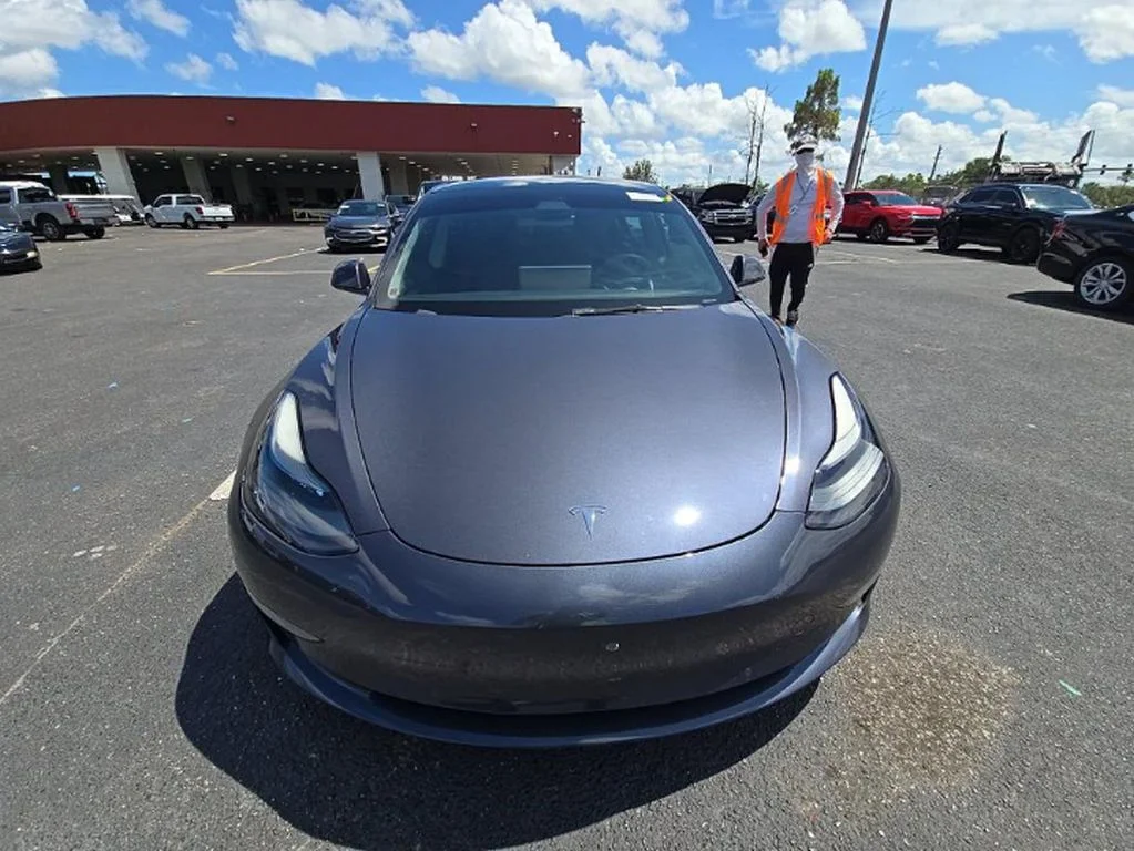 Used 2022 Tesla Model 3 Long Range with VIN 5YJ3E1EB9NF345020 for sale in Miami, FL