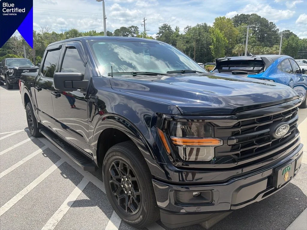 Certified Used 2024 Antimatter Blue Metallic Ford XLT image 1