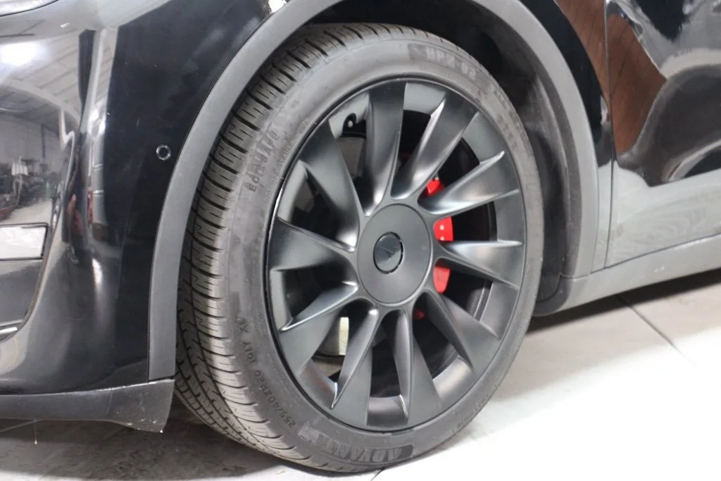 Used 2022 Solid Black Tesla Performance image 2
