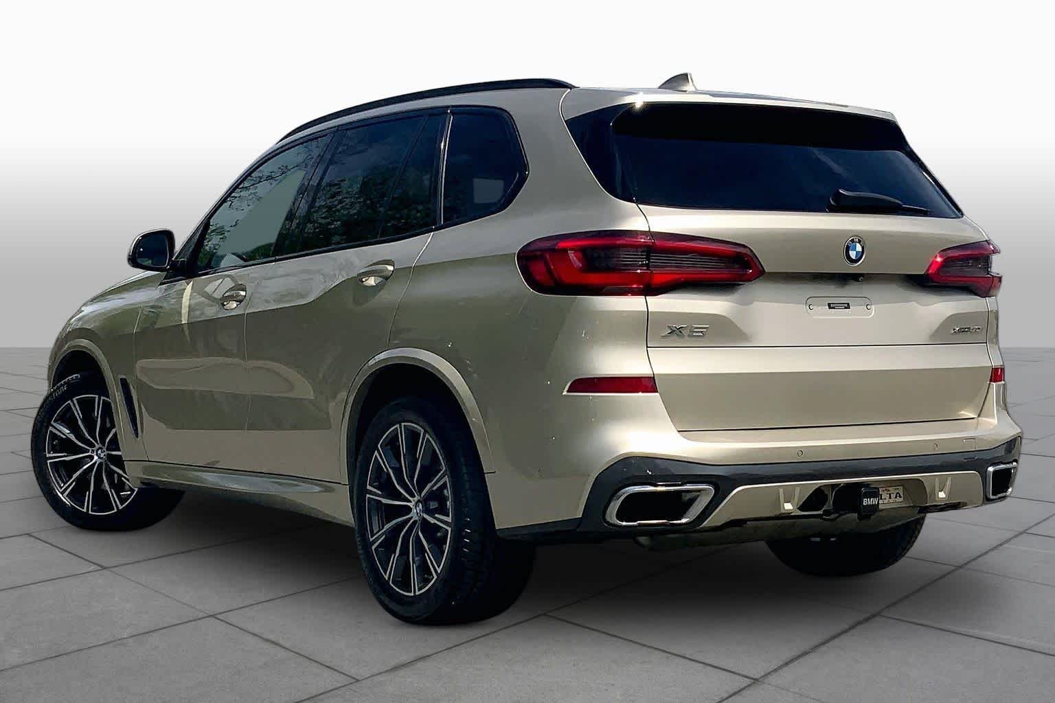 Used 2019 Sunstone Metallic BMW xDrive50i image 12