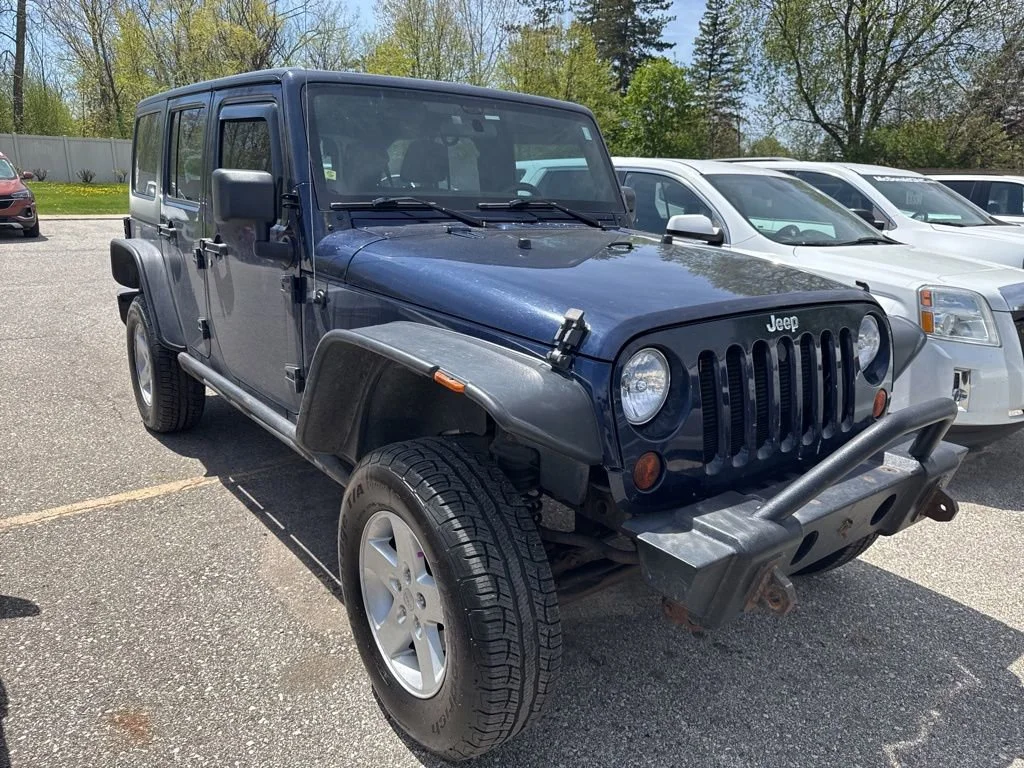 Used 2013 Jeep Wrangler Unlimited Sport with VIN 1C4BJWDG0DL505802 for sale in Saginaw, MI