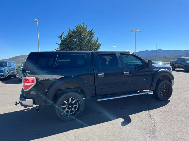 Used 2014 Tuxedo Black Metallic Ford XLT image 7