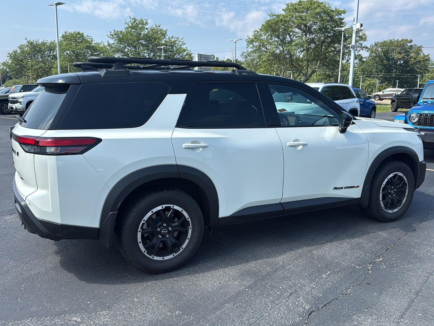 Used 2024 Pearl White Tricoat/Super Black Nissan Rock Creek image 8