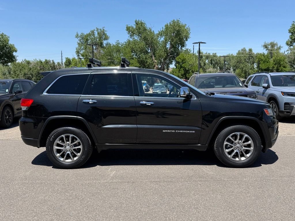 Used 2014 Brilliant Black Crystal Pearlcoat Jeep Limited image 3