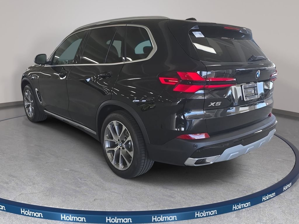 New 2026 Black Sapphire Metallic BMW sDrive40i image 6