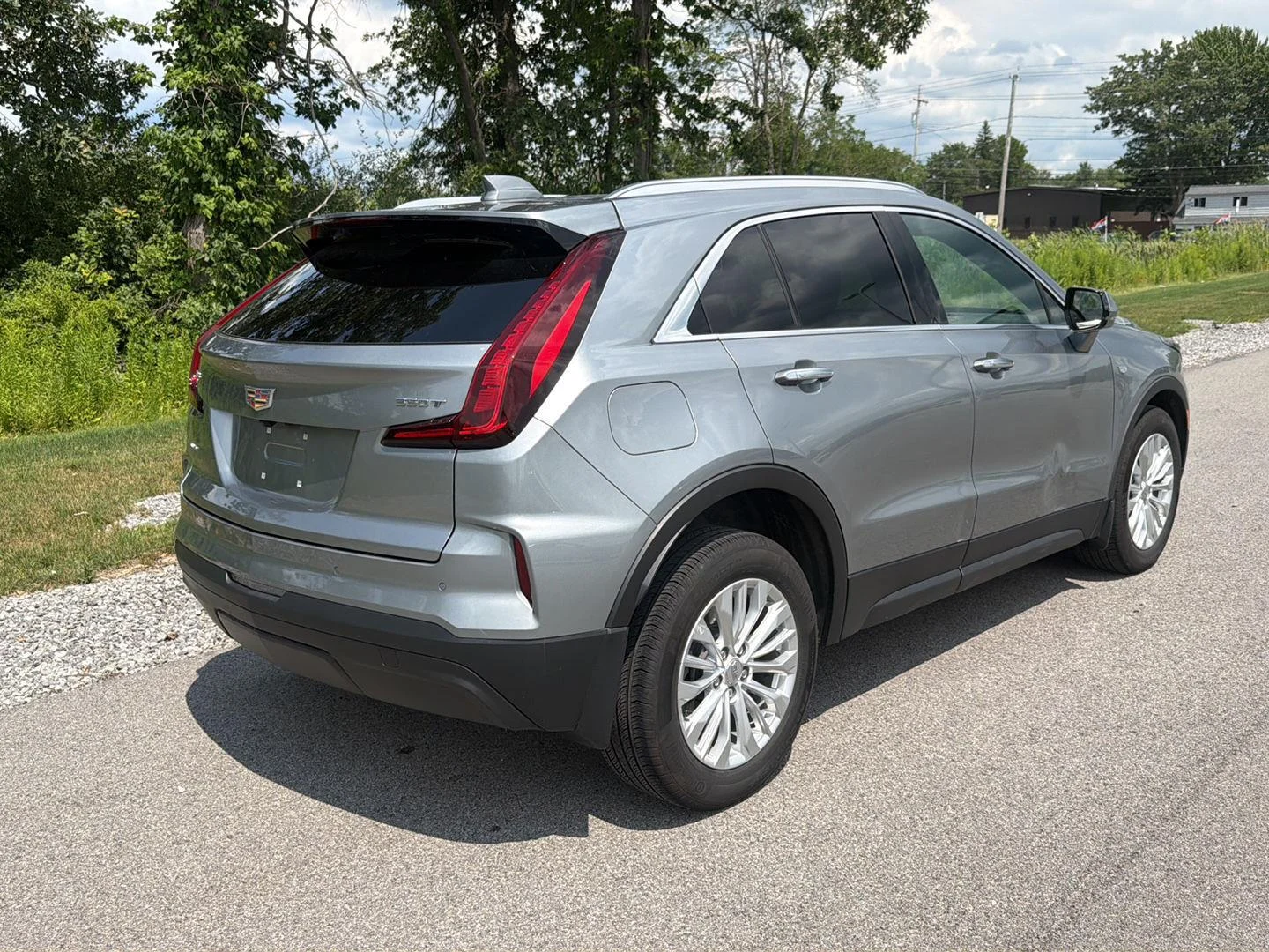 Used 2024 Argent Silver Metallic Cadillac AWD Luxury image 4