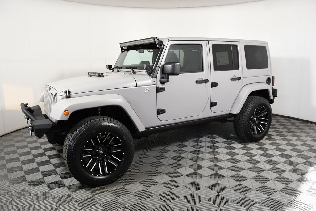 Used 2013 Jeep Wrangler Unlimited Sport with VIN 1C4HJWDG9DL660732 for sale in Richfield, Minnesota
