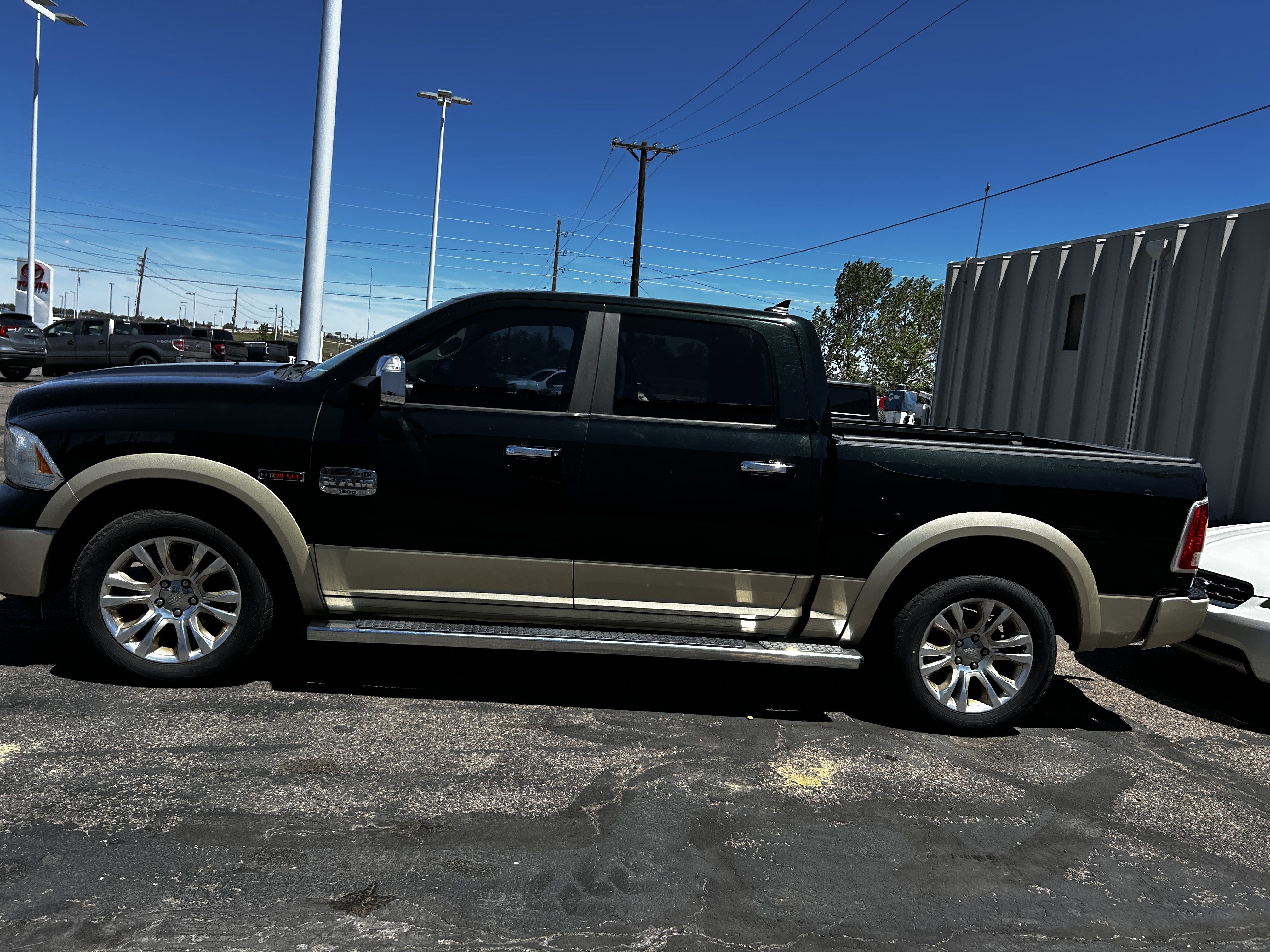 Used 2015 RAM Ram 1500 Pickup Laramie Longhorn with VIN 1C6RR7PM2FS621971 for sale in Cheyenne, WY