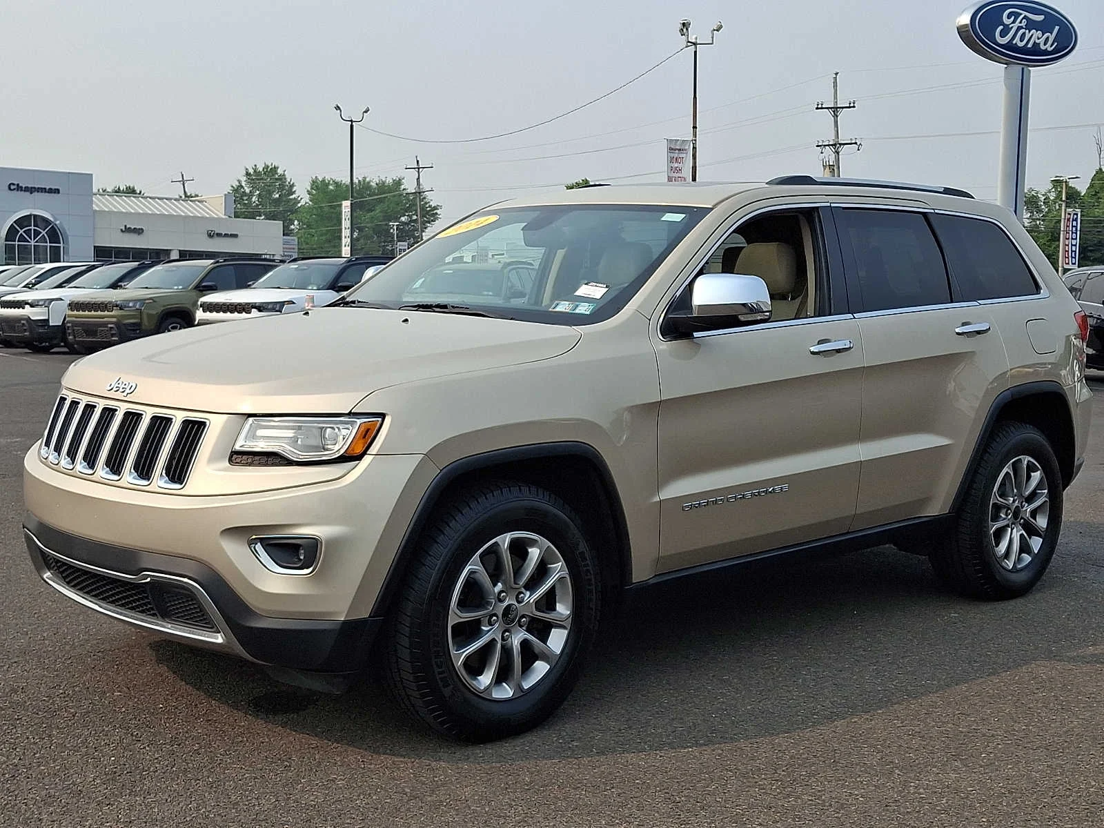 Used 2014 Cashmere Pearlcoat Jeep Limited image 3
