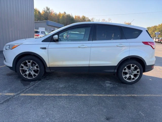 Used 2013 Ford Escape SEL with VIN 1FMCU9H90DUB00053 for sale in Manistee, MI