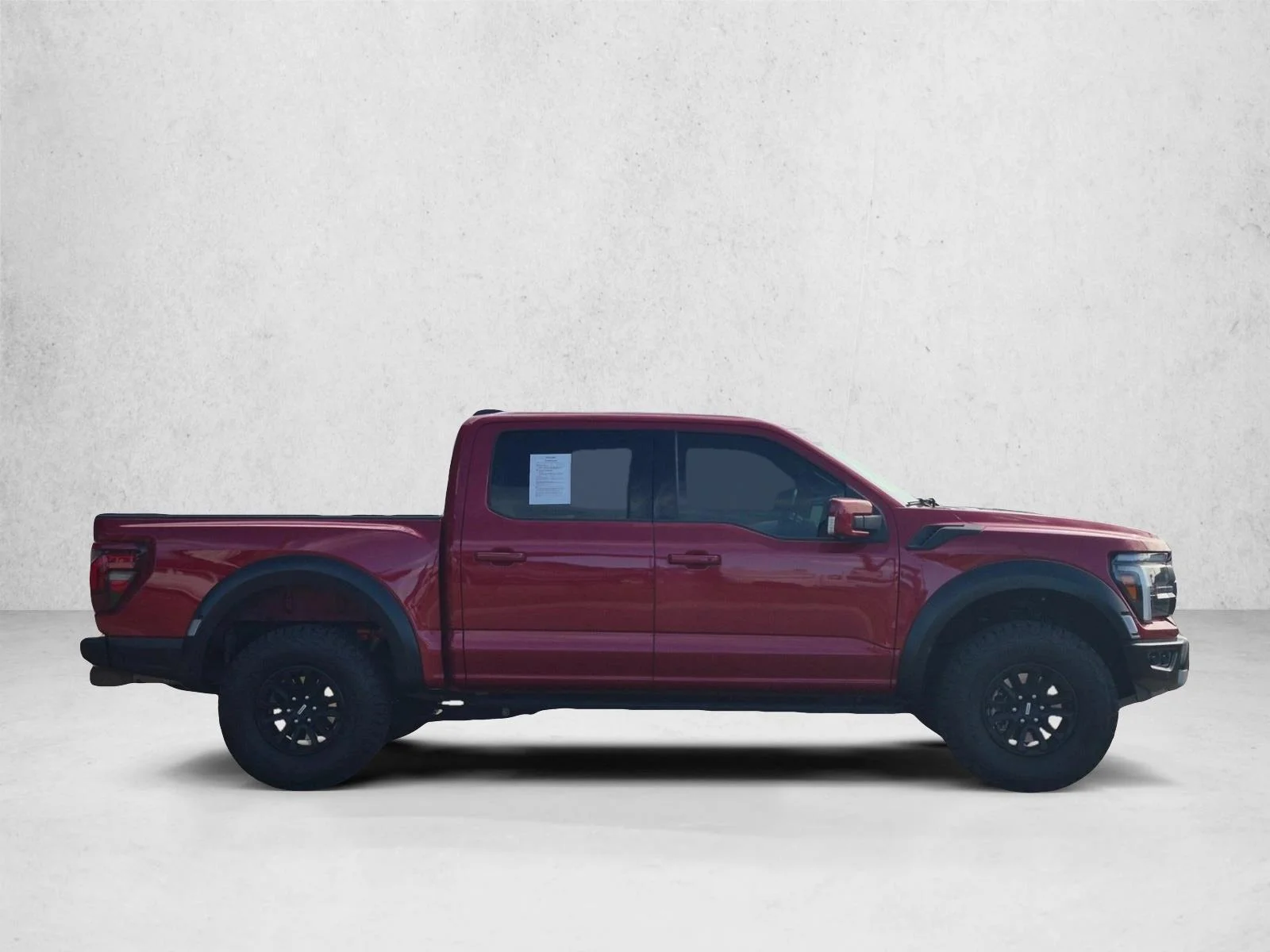 Certified Used 2025 Rapid Red Metallic Tinted Clearcoat Ford Raptor image 4