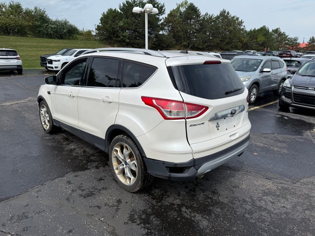 Used 2015 Ford Escape Titanium with VIN 1FMCU0J98FUC41283 for sale in Brighton, MI