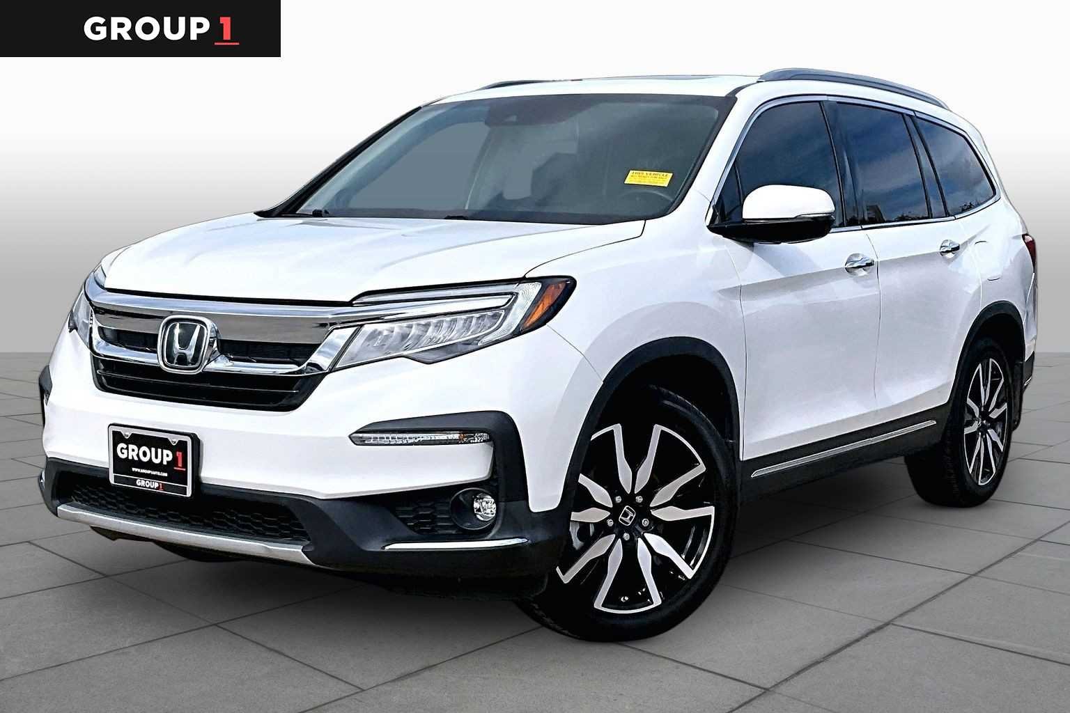 Used 2022 White Honda 2WD Touring 8 Passenger image 1