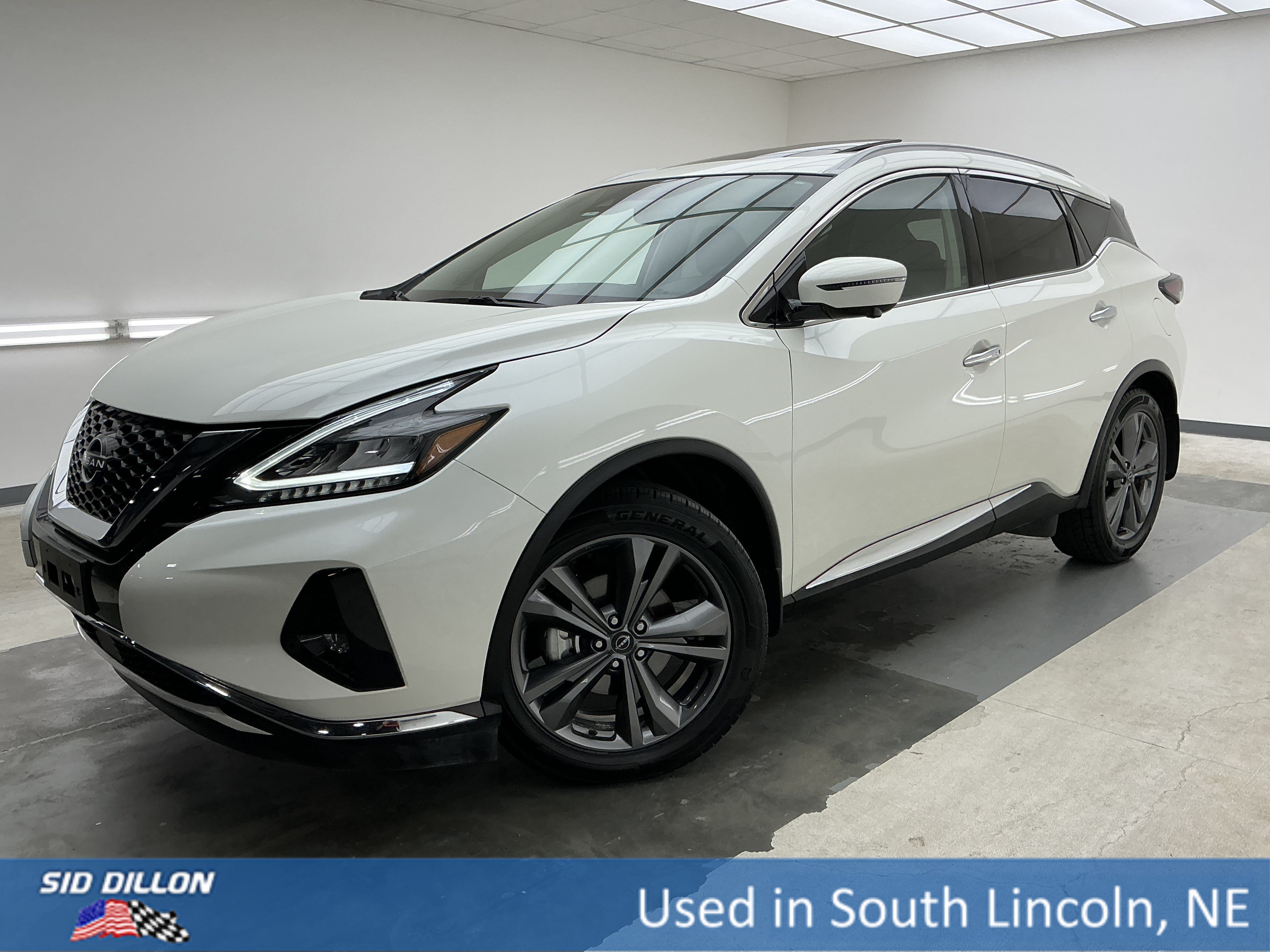 Used 2023 Pearl White Tricoat Nissan Platinum image 1