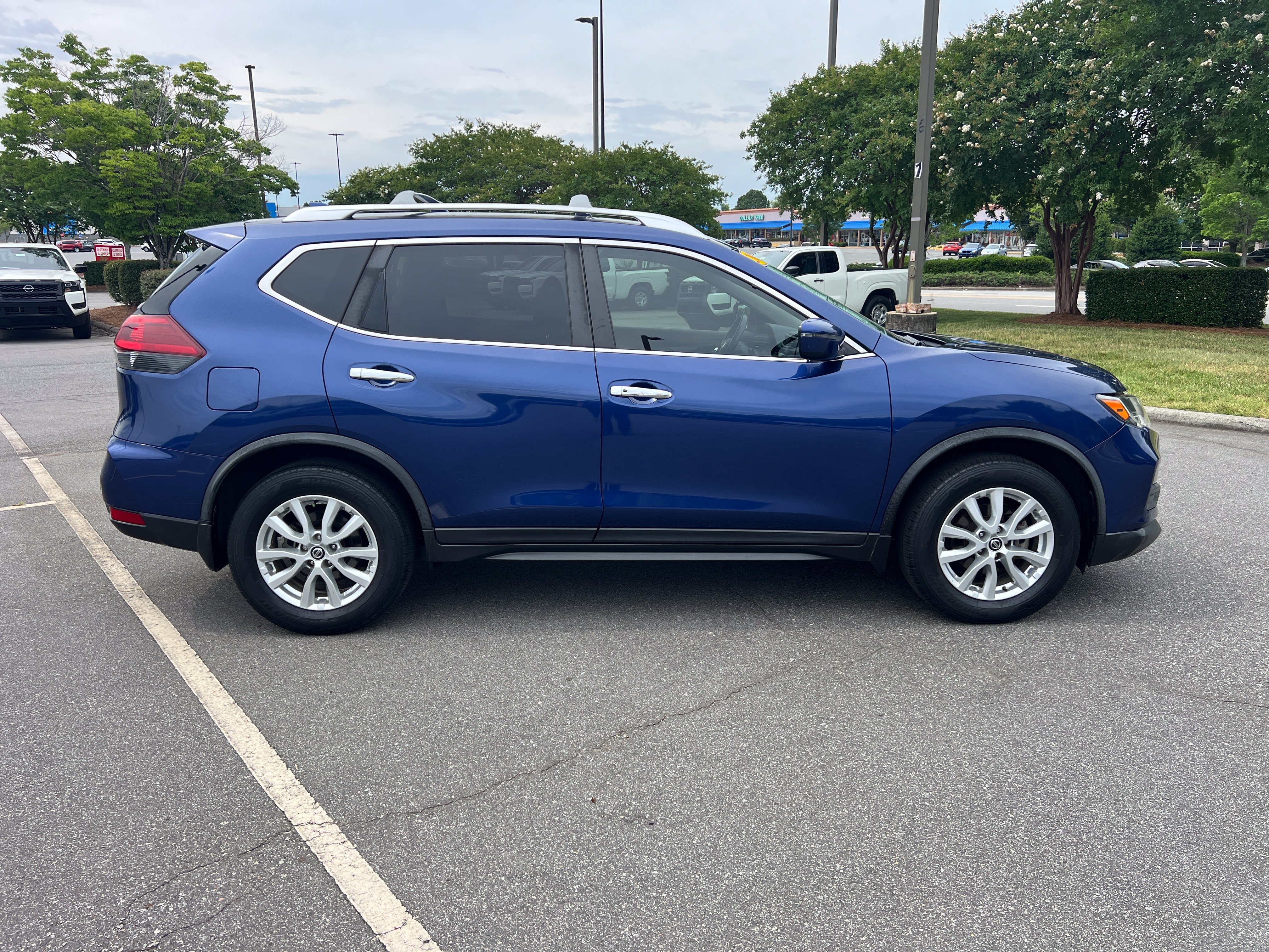 Used 2019 Caspian Blue Metallic Nissan SV image 4