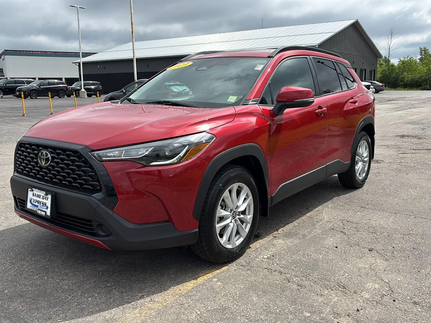 Used 2023 Barcelona Red Metallic Toyota LE image 3