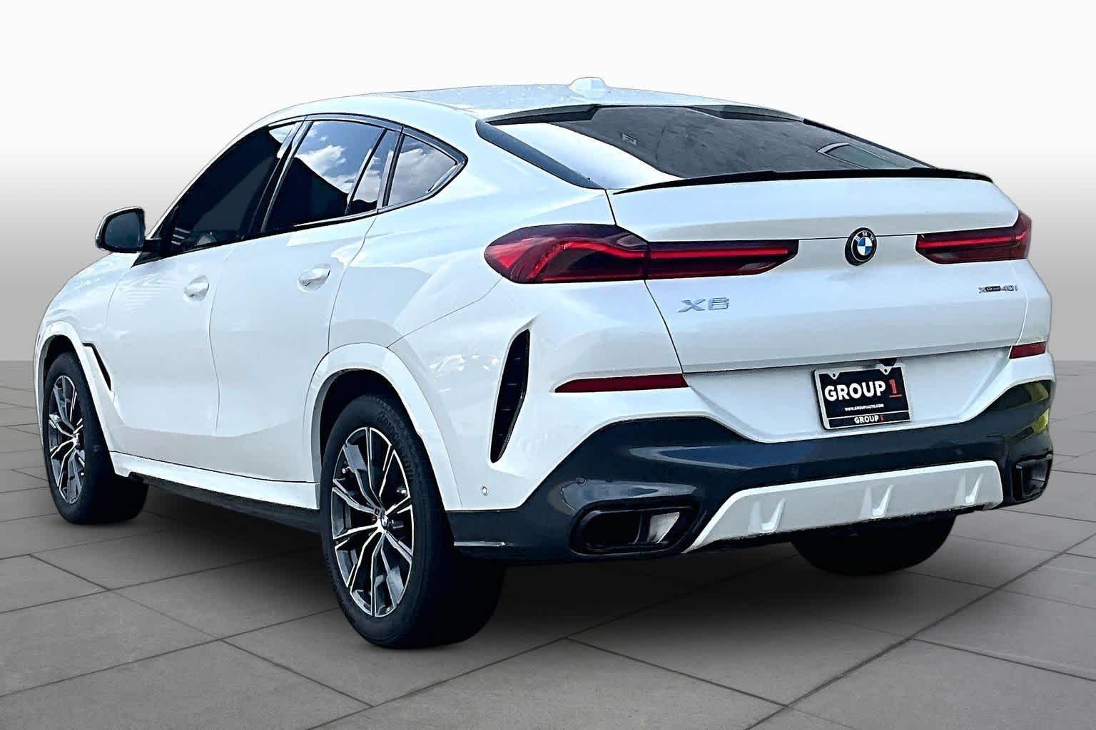 Used 2024 Mineral White Metallic BMW xDrive40i image 12