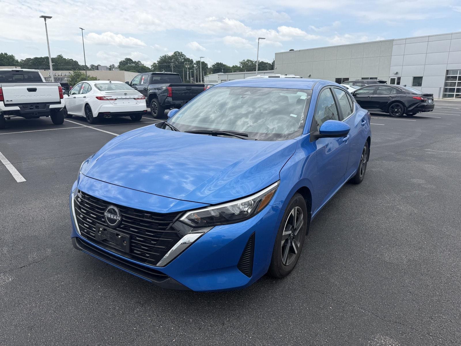 Used 2025 Electric Blue Metallic Nissan SV image 3